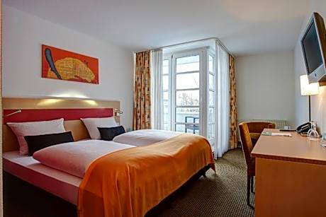 Comfort Room with One Double Bed or Two Single Beds