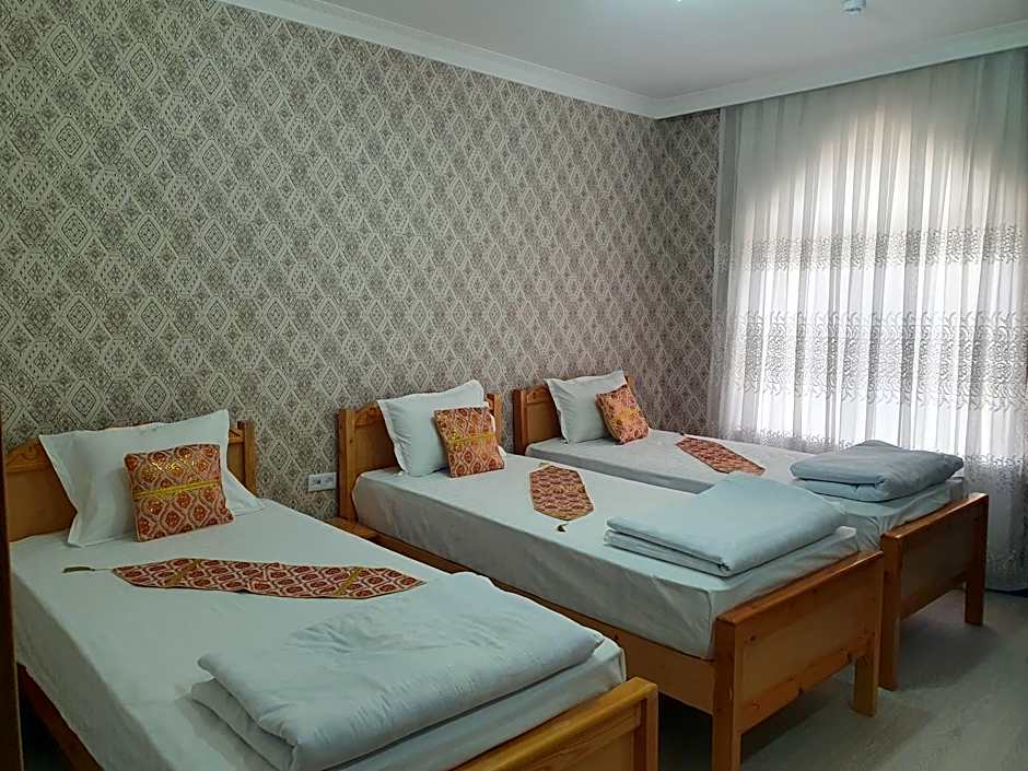 Photo 1 of 10 of Triple Room with Private Bathroom