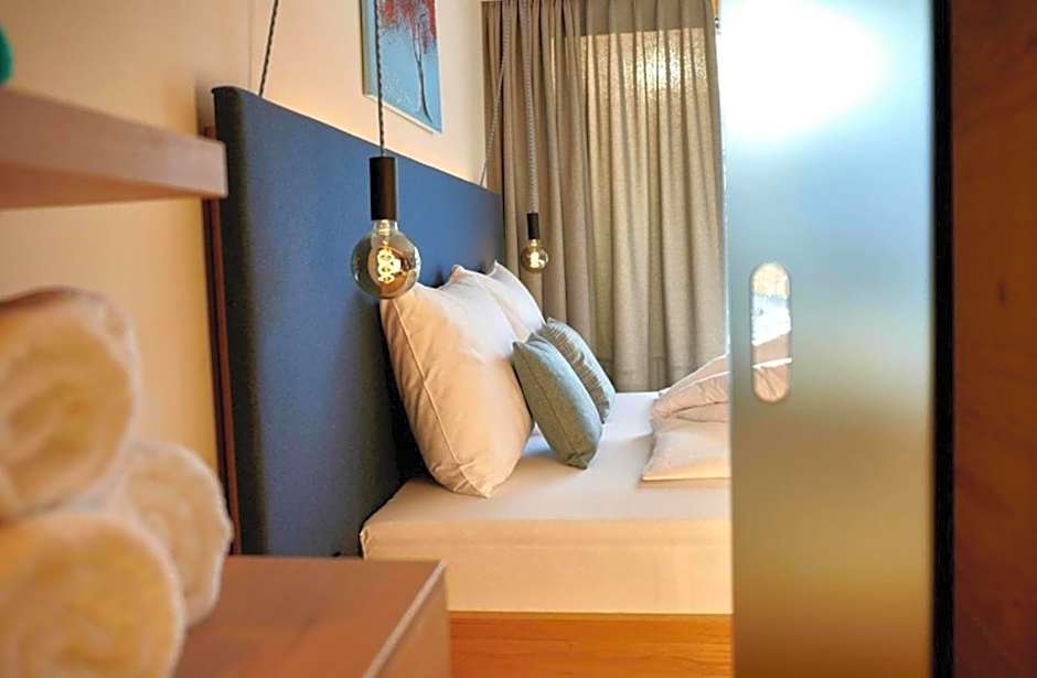Wellness und Brunch Hotel MorgenZeit beheizter Naturteich Genuss Frühstück bis 13 Uhr Hochkönig Sommercard