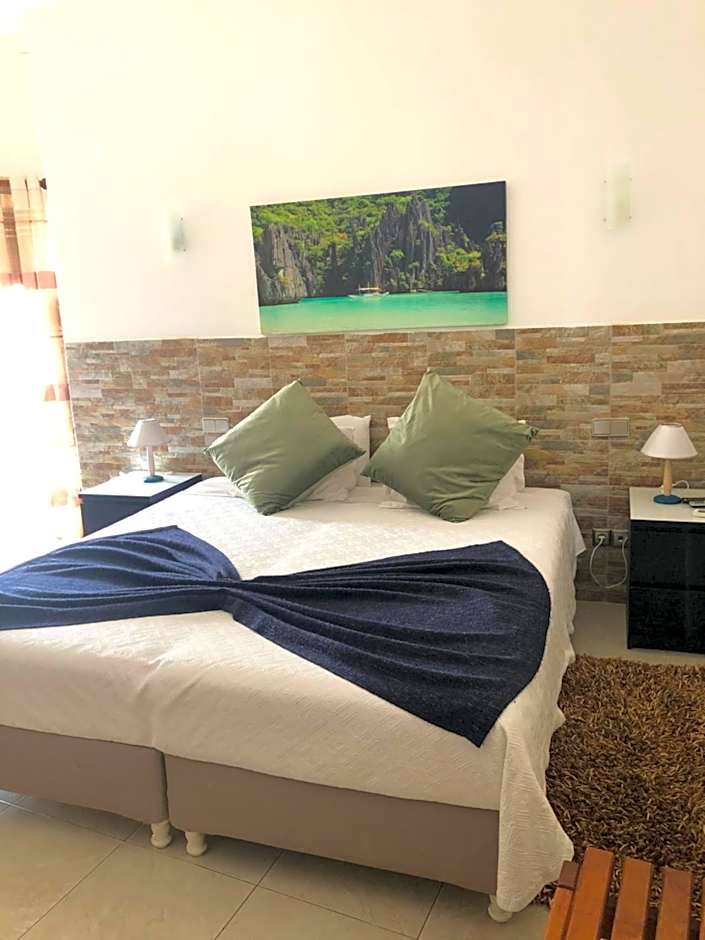 Apartamentos e Quartos Atalaia