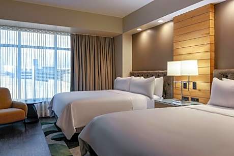 Guest Room with Two Queen Beds and City View