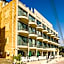 Olivia Palm Hotel