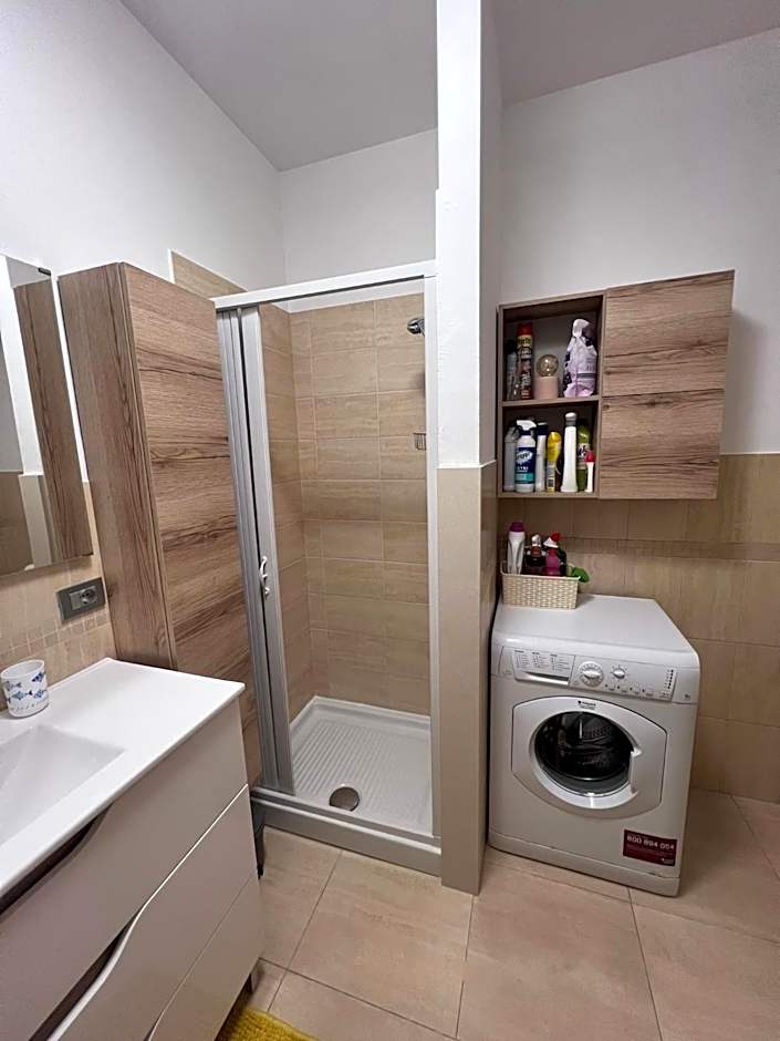Casa Antia, nuovo bilocale con giardino in Residence con piscina