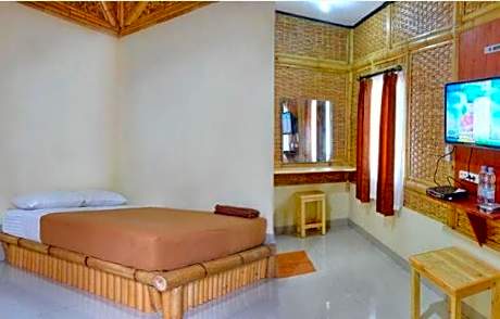 OYO 3303 Penginapan Putri Asih Sawarna