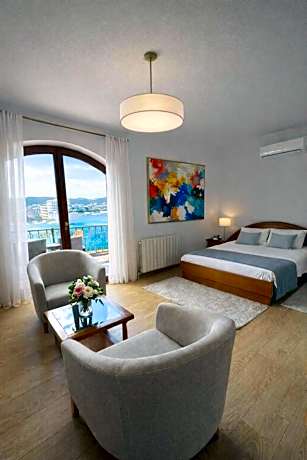 Three-Bedroom Apartment with Terrace and Sea View