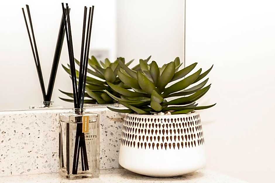 Modern Nordic Escape, 3BR Near WEM & DT, AirCon & Fireplace, Wifi, Sleeps 6!