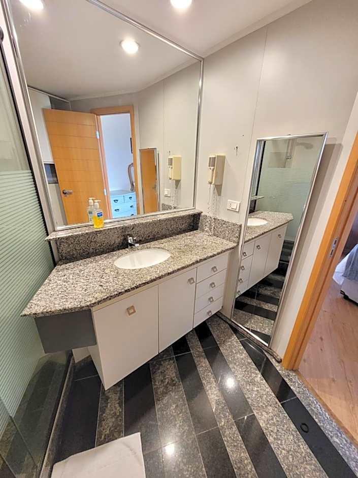 Flat no Golden Tulip By Rei dos Flats