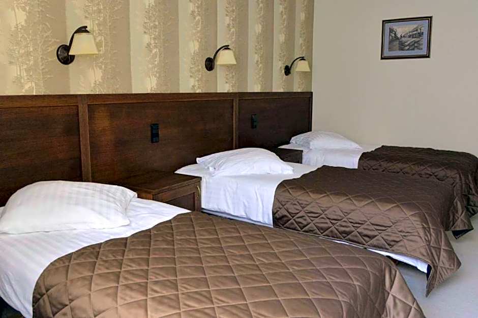 Photo 1 of 2 of Triple Room
