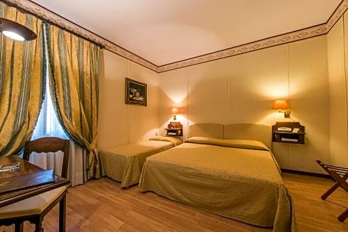 Photo 1 of 4 of Classic Triple Room
