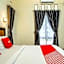 Capital O 90643 Suri Guest House Syariah