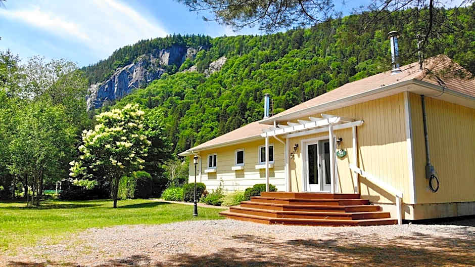 Tranquil Riverfront Chalet with Hot Tub