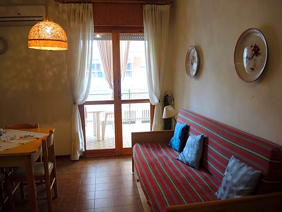 Warm two-room flat with terrace near the beach
