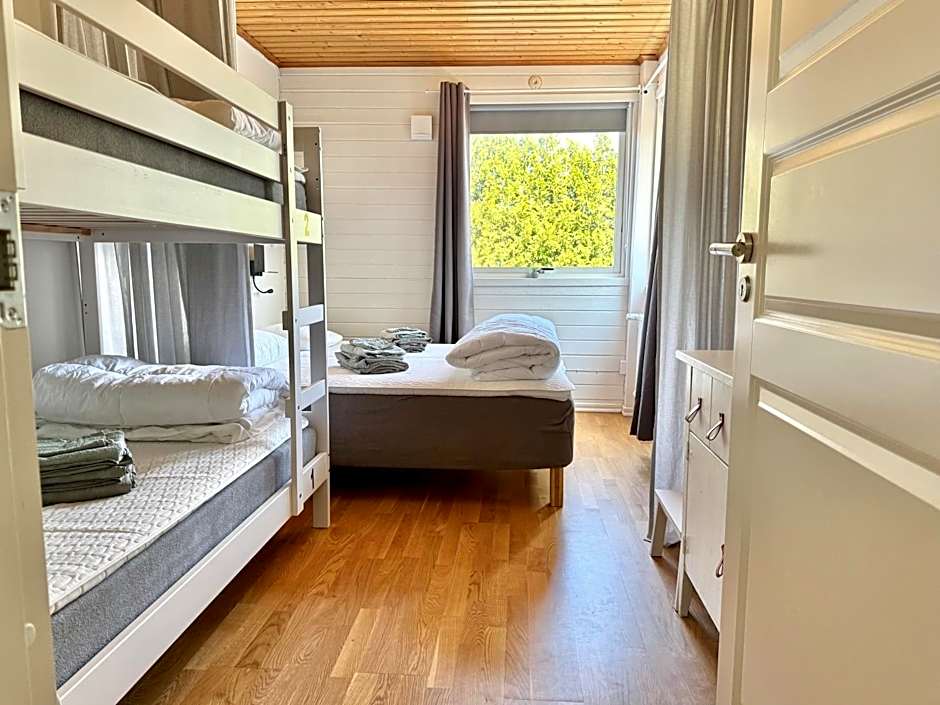Comfortable guest rooms with fully equipped kitchen and cosy living room.