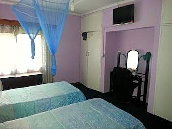 Photo 1 of 1 of Twin Room with Shared Bathroom