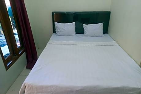 Hotel O Chimi Rumah Kost