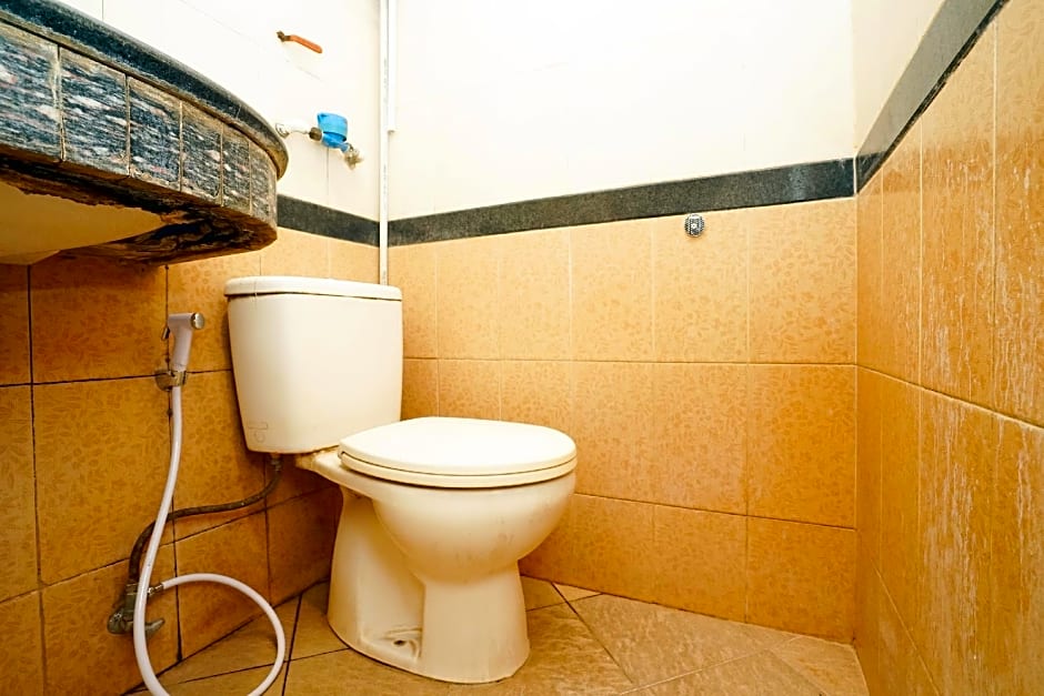 Vaccinated Staff - OYO 658 Alibaba Residence