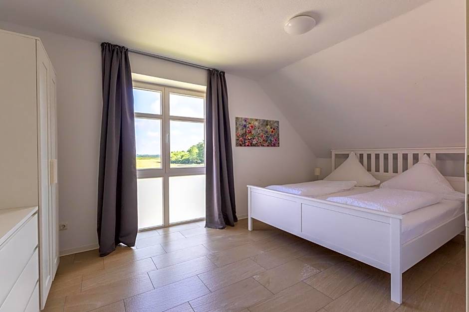 Natura Ferienhaus, Ferienwohnungen in Rhauderfehn , Komfort für Gäste & Firmen ,WLAN & Parkplatz