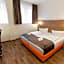 Orange Hotel und Apartments