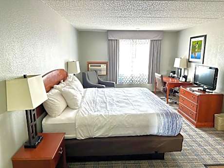 1 King Bed 1 Queen Bed 2-Bedroom Family Suite Jetted Tub Non-Smoking