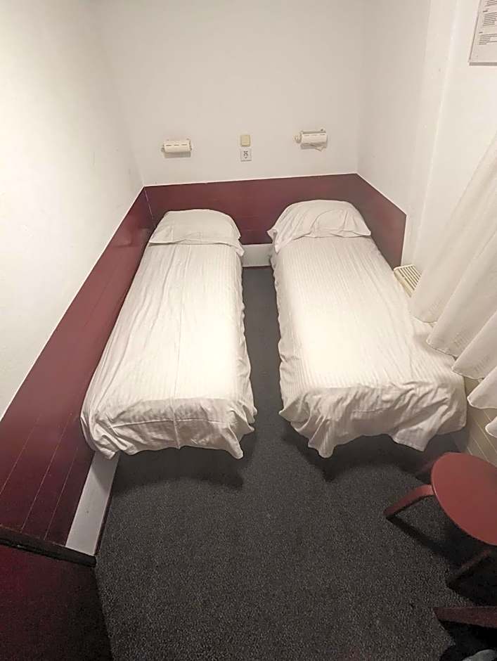 Photo 1 of 2 of Standard Twin Room with Shared Bathroom