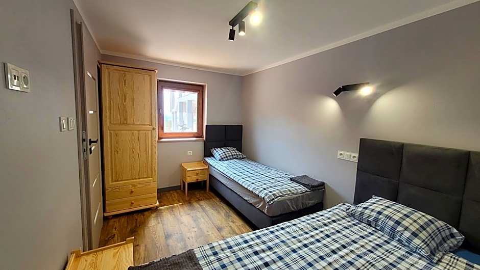 Wrzosowe Wzgórze 5 - Studia i Apartamenty