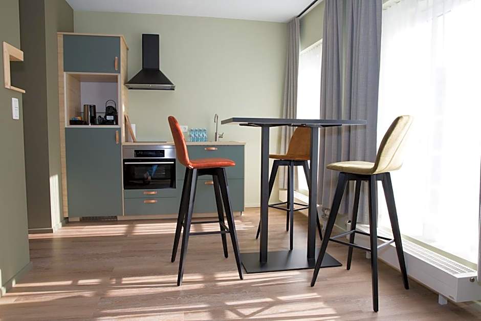 Appart hôtel En Ville