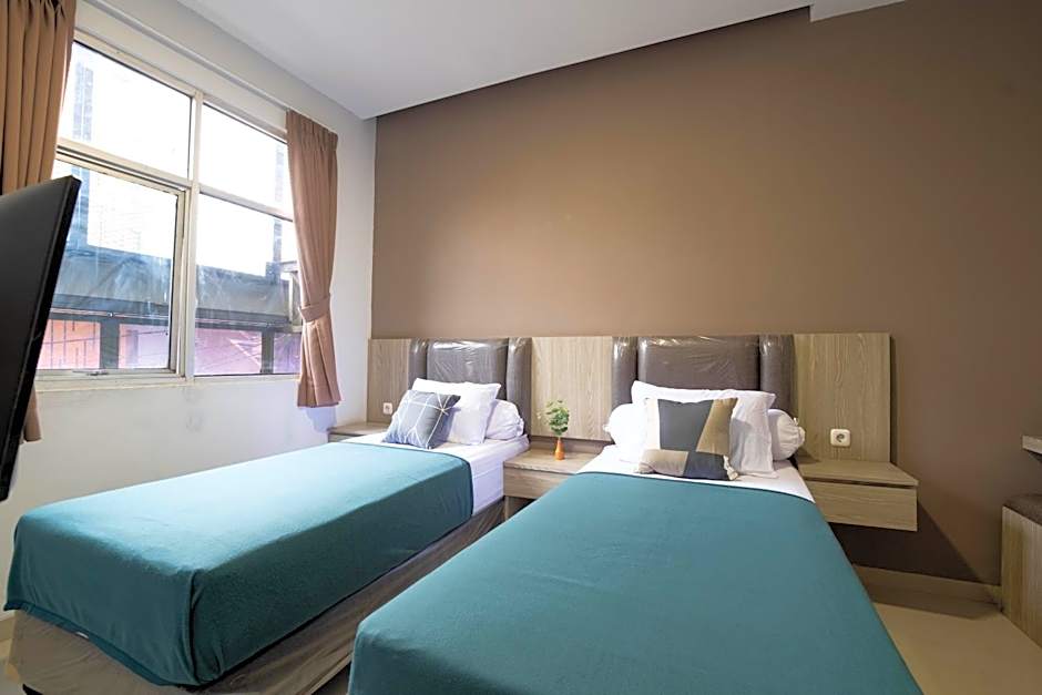 Kelowna Mangga Besar by AbdiHome