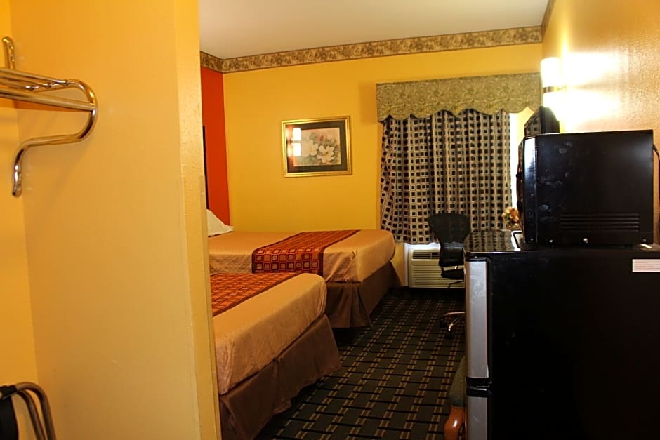 Magnolia Inn And Suites