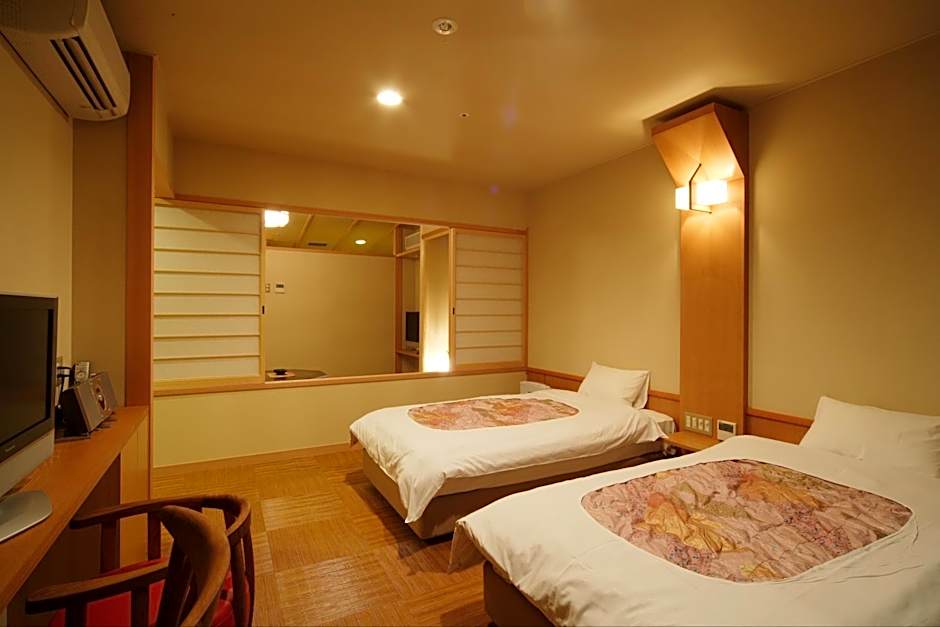 Photo 1 of 9 of Quadruple Room with Private External Bathroom