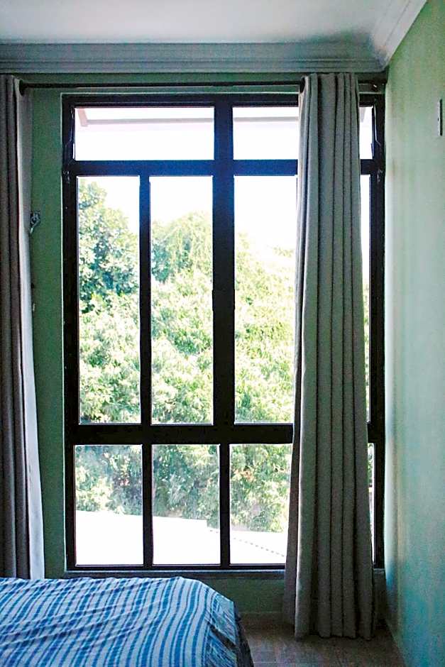 Paradise Hostel e Flats