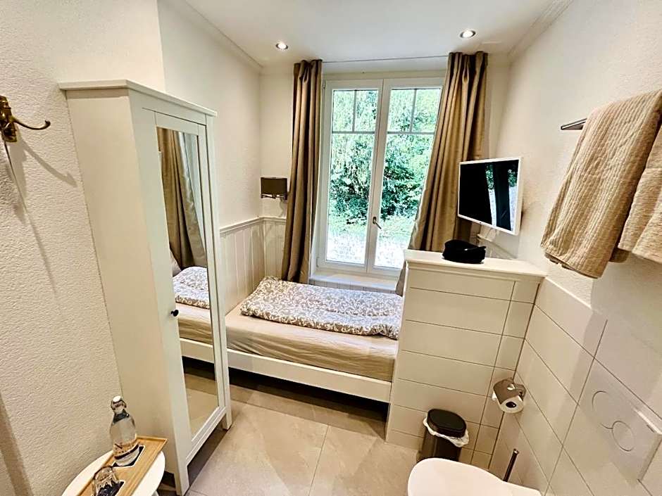 Boutique Hotel Niesenblick - direkt am Thunersee gelegen mit SELF CHECK IN & digitaler Rezeption
