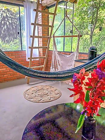 Suíte com Mezanino e Cachoeira no Quintal