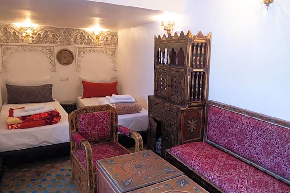 Photo 1 of 2 of Triple Room with Private Bathroom