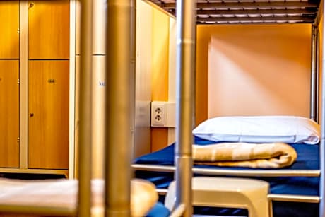 Single Bed in Female Dormitory Room