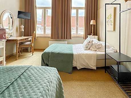 Quadruple Room (2 Adults + 2 Children)