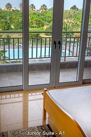 Junior Suite with Pool View (2 Adults + 2 Children)