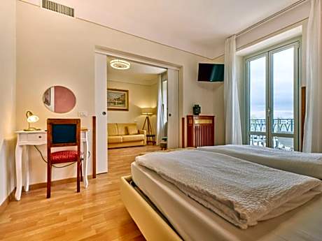 Suite with balcony and lake view