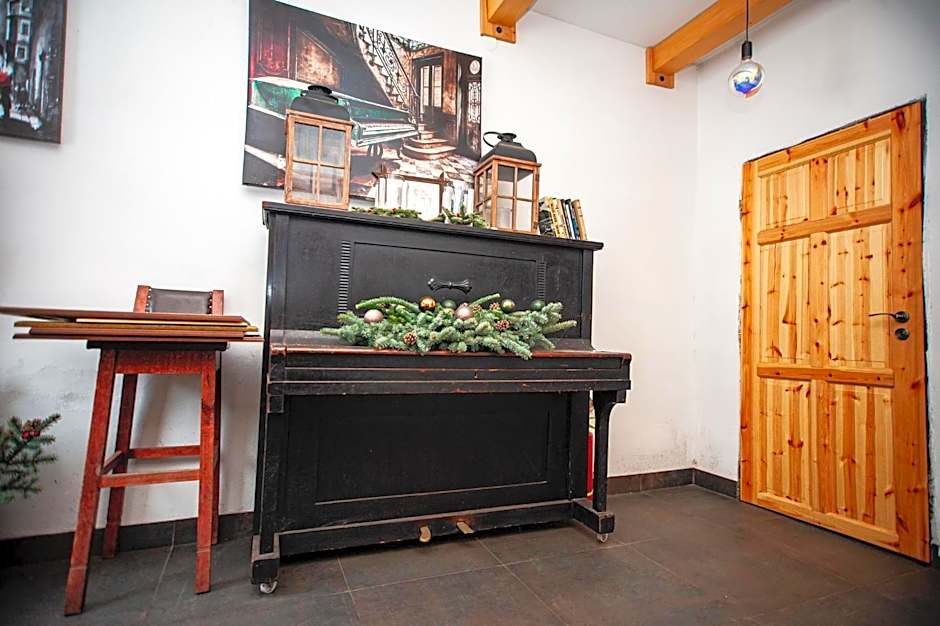 Hostinec pod úbočou