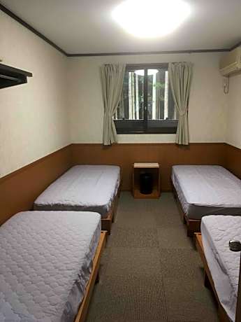 Quadruple Room with Shared Bathroom