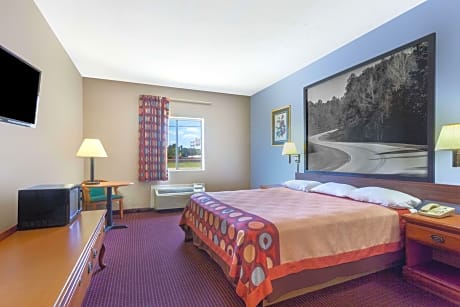 1 King Bed Mobility Accessible Room Smoking