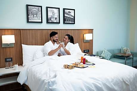 Deluxe King Room with City View & 20% off on Food & Beverages and 2 pieces of ironing daily