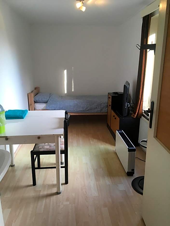 Photo 1 of 13 of Single Room with Shared Bathroom