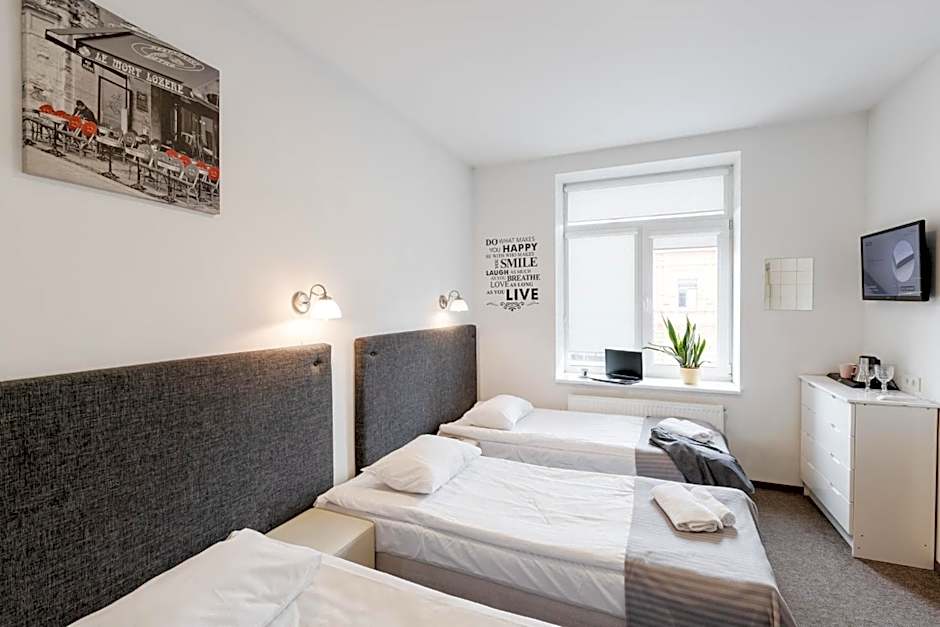 Photo 1 of 12 of Triple Room with Shared Bathroom