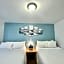 Bluebird Day Inn & Suites