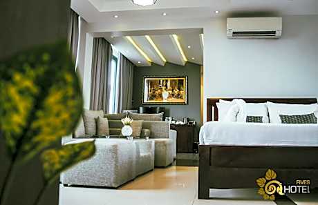 Family Suite Natural Room with Garden Balcony and Pool View