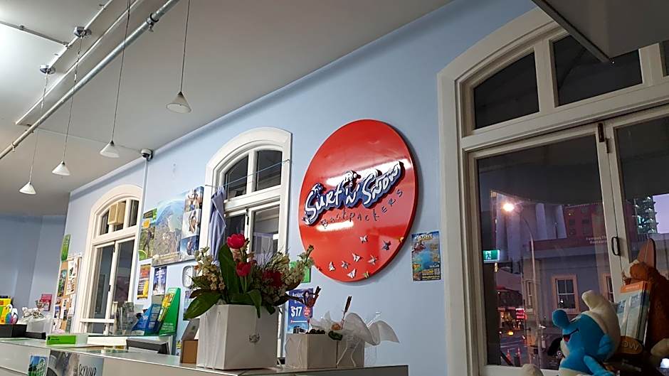 Surf 'N' Snow Backpackers Across Sky Tower