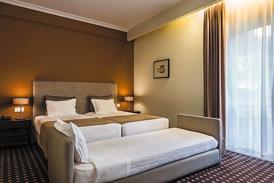 Photo 1 of 4 of Triple Room