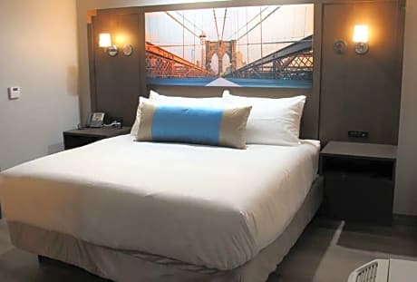 Accessible - Suite King Bed  Mobility Accessible Bathtub Separate Bedroom Sofabed Full Kitchen Non-S