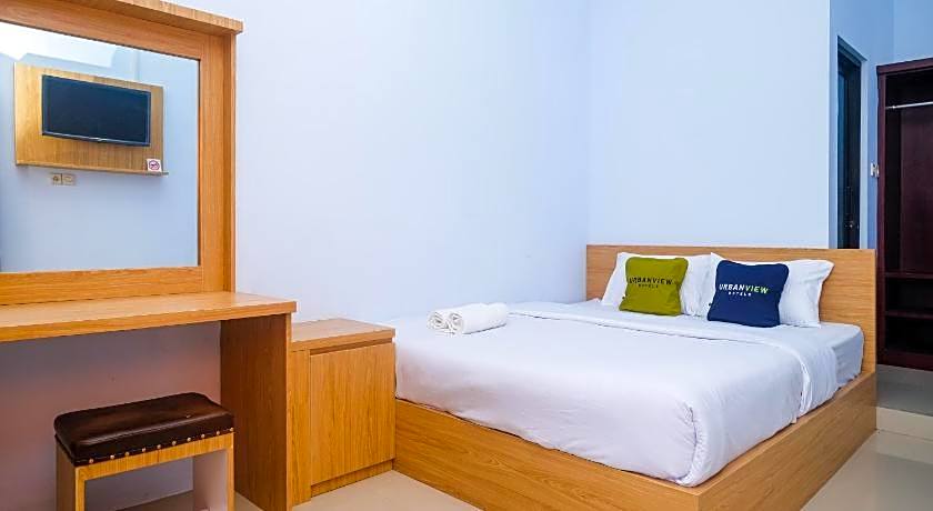 Capital O 92436 Wisma Syariah Nabil