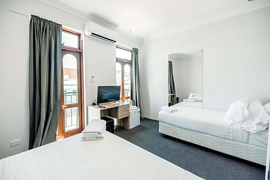 Photo 1 of 5 of Standard Twin Room with Shared Bathroom